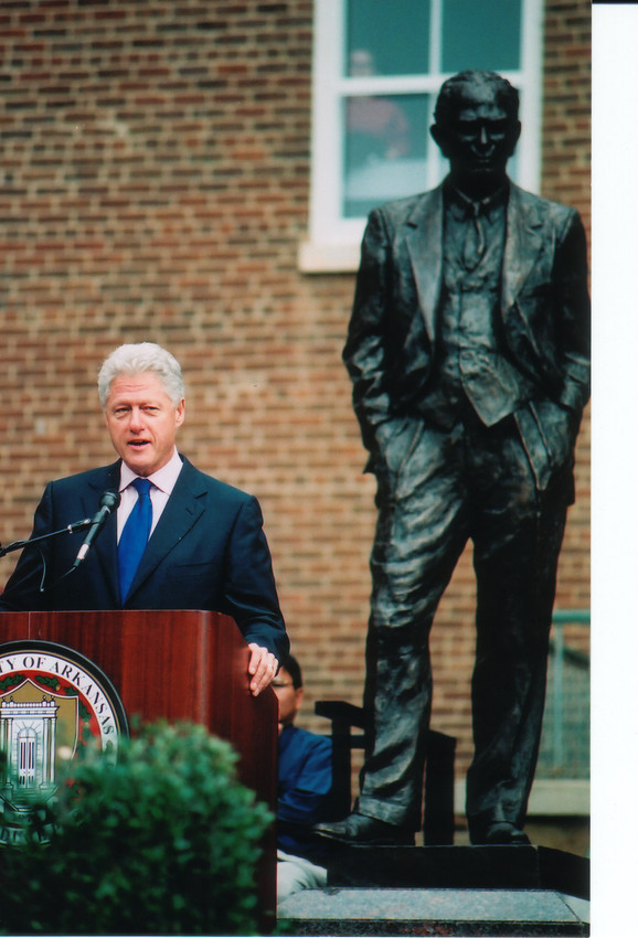 President Bill Clinton addresses a crowd gathered on the University of Arkansas.
